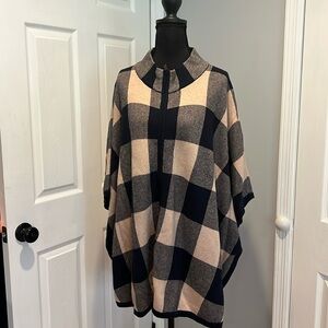 - Zipper poncho cape, navy and cream color. One size